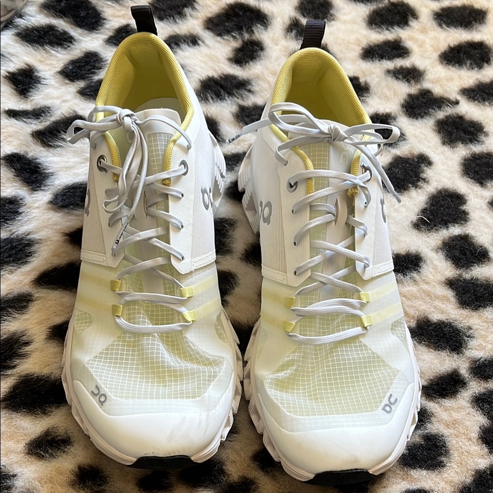 On Running White and Yellow Athletic Shoes with Breathable Mesh